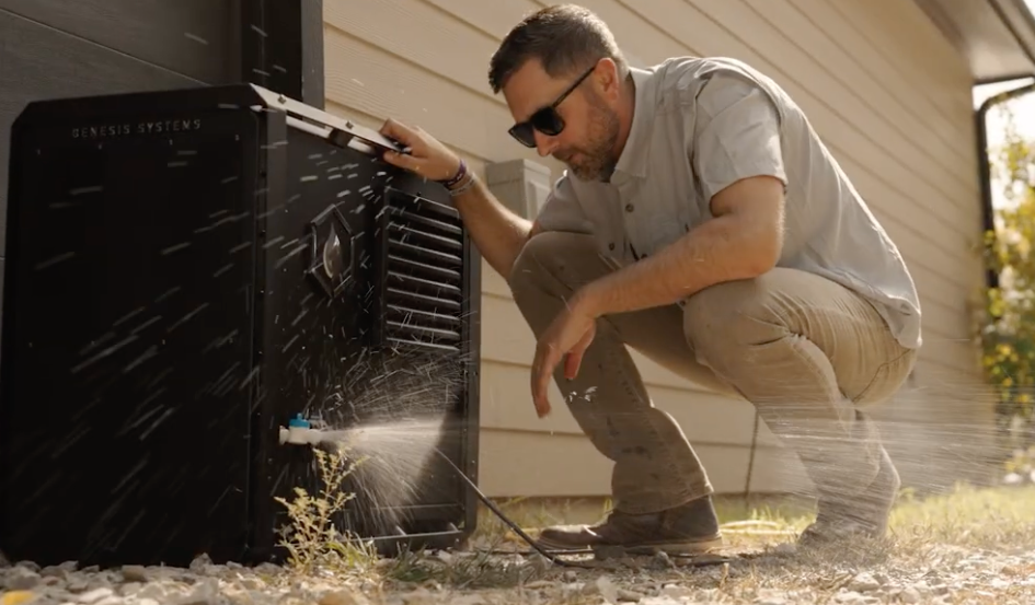 Chase inspecting one of our water systems